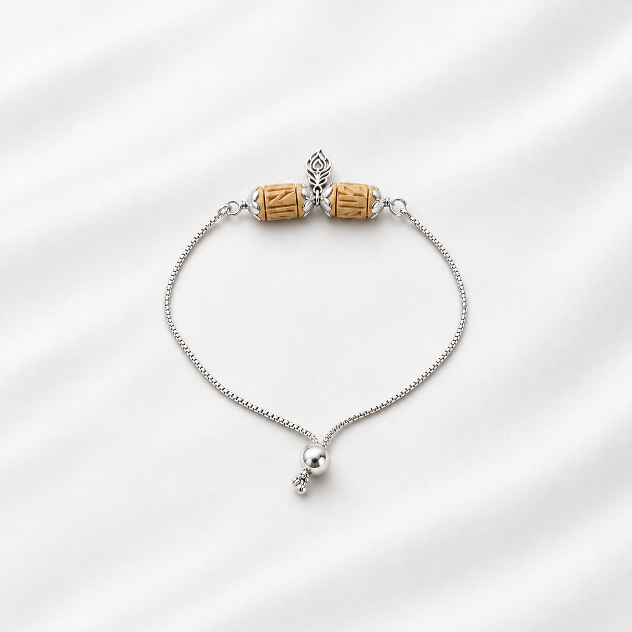 Silver chain bracelet with tulsi carved wooden beads and feather silver detailing