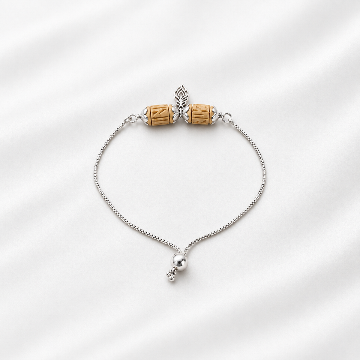 Silver chain bracelet with tulsi carved wooden beads and feather silver detailing