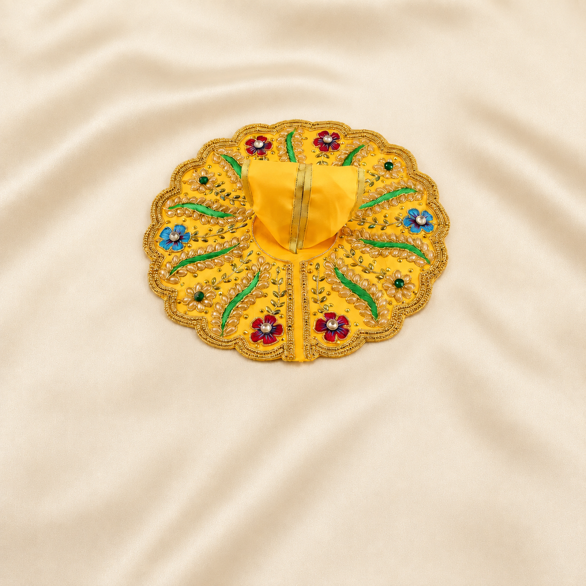 Yellow Laddu Gopal dress with colourful floral embroidery and golden border.